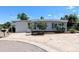 Charming single-story home featuring well-maintained landscaping and a concrete driveway at 2032 Tulane St, Denver, CO 80260