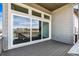 Covered deck featuring a large sliding glass door providing great outdoor access and light at 3884 Freestone Pt, Castle Rock, CO 80108