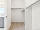 Walk-in closet with ample shelving, providing plenty of storage space and organization options at 3884 Freestone Pt, Castle Rock, CO 80108