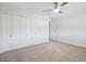Clean bedroom featuring a large closet with a neutral-toned carpet at 635 S Alton Way # 1C, Denver, CO 80247
