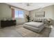 Main bedroom with large bed and neutral decor at 635 S Alton Way # 1C, Denver, CO 80247