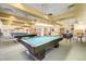 Well-lit billiards room with multiple pool tables at 635 S Alton Way # 1C, Denver, CO 80247