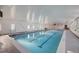 Indoor swimming pool with lanes and seating area at 635 S Alton Way # 1C, Denver, CO 80247