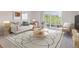 Comfortable living room with a sliding door opening to a balcony at 635 S Alton Way # 1C, Denver, CO 80247