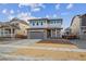 Charming two-story home with a well-maintained front yard and a two-car garage at 1362 Rock Cliff Ave, Erie, CO 80516