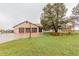 Charming single-story home with a three-car garage and a well-manicured lawn at 1341 Tomichi Dr, Franktown, CO 80116