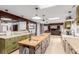 Large kitchen with open access to a living room and dining area at 1341 Tomichi Dr, Franktown, CO 80116