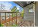 Balcony view of the fenced-in backyard and mature trees offers an outdoor retreat at 3061 W 92Nd Ave # 8B, Westminster, CO 80031
