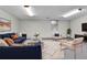 Relaxing basement area featuring stylish furniture, modern lighting and neutral walls at 3061 W 92Nd Ave # 8B, Westminster, CO 80031