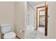 Bathroom featuring a toilet and a shower and tub combination at 3061 W 92Nd Ave # 8B, Westminster, CO 80031