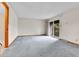 Bedroom with carpeting and sliding glass doors that lead to a balcony at 3061 W 92Nd Ave # 8B, Westminster, CO 80031