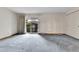 Bedroom with carpeting, closet, and sliding glass doors that lead to a balcony at 3061 W 92Nd Ave # 8B, Westminster, CO 80031