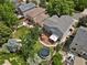 Aerial shot showcasing the backyard with a trampoline, deck, and lush greenery, perfect for outdoor enjoyment at 9665 Whitecliff Pl, Highlands Ranch, CO 80129