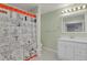 Charming bathroom boasts a Peanut's themed shower curtain, bright lighting, and stylish fixtures at 9665 Whitecliff Pl, Highlands Ranch, CO 80129