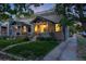 Stone duplex with large front yard showcasing the property's character and neighborhood charm at 194 S Emerson St, Denver, CO 80209