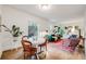 Inviting living room with hardwood floors, eclectic decor, and bright natural light, perfect for entertaining at 194 S Emerson St, Denver, CO 80209