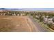 Aerial shot showcasing the neighborhood with a clear view of the surrounding landscape and mountains in the distance at 10640 Nw Routt Way, Westminster, CO 80021