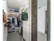 Well-organized walk-in closet with ample storage, shelving, and a view into the bedroom at 10640 Nw Routt Way, Westminster, CO 80021