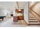 Finished basement with a bar, tiled floors, and a cozy fireplace seating area at 20401 High Pines Dr, Monument, CO 80132