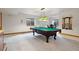 Basement features a pool table, wet bar, and a seating area at 20401 High Pines Dr, Monument, CO 80132