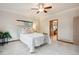 Comfortable bedroom with a ceiling fan and views of the property at 20401 High Pines Dr, Monument, CO 80132