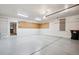 Spacious garage with painted floors, ample lighting and storage, and an automatic door opener at 20401 High Pines Dr, Monument, CO 80132