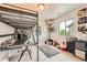 A bedroom with a loft bed, plush decor and a desk at 25128 E Maple Ave, Aurora, CO 80018