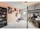 A room with a loft bed, books and various decor at 25128 E Maple Ave, Aurora, CO 80018