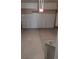 Clean and spacious garage featuring an automatic door and ample storage space at 1211 Bistre St, Longmont, CO 80501