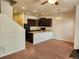 Open kitchen with sleek appliances and a breakfast bar, perfect for casual dining and entertaining at 1211 Bistre St, Longmont, CO 80501