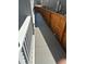 Narrow side yard featuring wood fence and concrete paver walk way at 2089 S Fultondale Way, Aurora, CO 80018