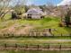 Aerial view of large home with well-maintained lawn and garden at 5425 S University Blvd, Greenwood Village, CO 80121