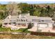 Spacious backyard with fire pit, covered seating, basketball court and three car garage at 5425 S University Blvd, Greenwood Village, CO 80121