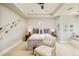 Cozy bedroom with neutral tones, stylish decor, and a comfortable window seat, creating a relaxing retreat at 5425 S University Blvd, Greenwood Village, CO 80121