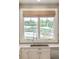Bright kitchen area with a scenic view of horses grazing in the pasture at 5425 S University Blvd, Greenwood Village, CO 80121