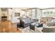 Cozy living area flowing into a modern kitchen and dining space at 5425 S University Blvd, Greenwood Village, CO 80121