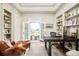 Elegant home office with custom built-ins and french doors to the garden at 5425 S University Blvd, Greenwood Village, CO 80121