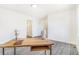 Bright bedroom featuring laminate flooring and neutral wall colors at 18751 E Mexico Ave, Aurora, CO 80017