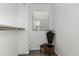 Bright closet space with a mirror and a chair at 720 16Th St # 505, Denver, CO 80202