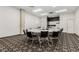 Spacious conference room with large table and kitchenette area at 720 16Th St # 505, Denver, CO 80202