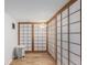 Unique room featuring Japanese-style sliding doors and hardwood floors at 720 16Th St # 505, Denver, CO 80202