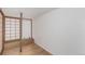 Unique room featuring Japanese-style sliding doors, a wooden platform, and hardwood floors at 720 16Th St # 505, Denver, CO 80202