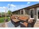 Inviting patio featuring cozy seating and string lights, ideal for outdoor entertaining and relaxation at 11037 Cambridge Pl, Parker, CO 80138
