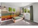 Stylish bedroom featuring a wooden bed frame and bright natural light at 11037 Cambridge Pl, Parker, CO 80138