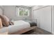 Bright bedroom with large windows, closet, and comfortable bed for relaxation at 11037 Cambridge Pl, Parker, CO 80138