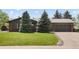 Charming single Gathering home with lush lawn, mature trees, and attached two car garage at 11037 Cambridge Pl, Parker, CO 80138