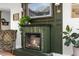Close up on decorative fireplace with beautiful detailing and bright natural light at 11037 Cambridge Pl, Parker, CO 80138