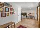 Bright entryway with hardwood floors, light neutral walls and views to the living area at 11037 Cambridge Pl, Parker, CO 80138