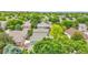 Overhead view of a home with a gray roof surrounded by lush green trees at 10571 Garfield St, Thornton, CO 80233