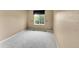 Cozy bedroom with neutral carpet and a bright window at 10571 Garfield St, Thornton, CO 80233